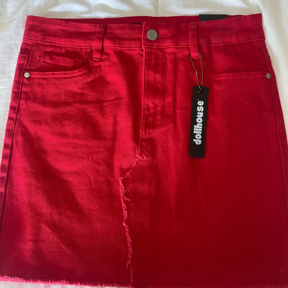 Dollhouse red denim skirt, with pockets, has never been worn and still has tags!
